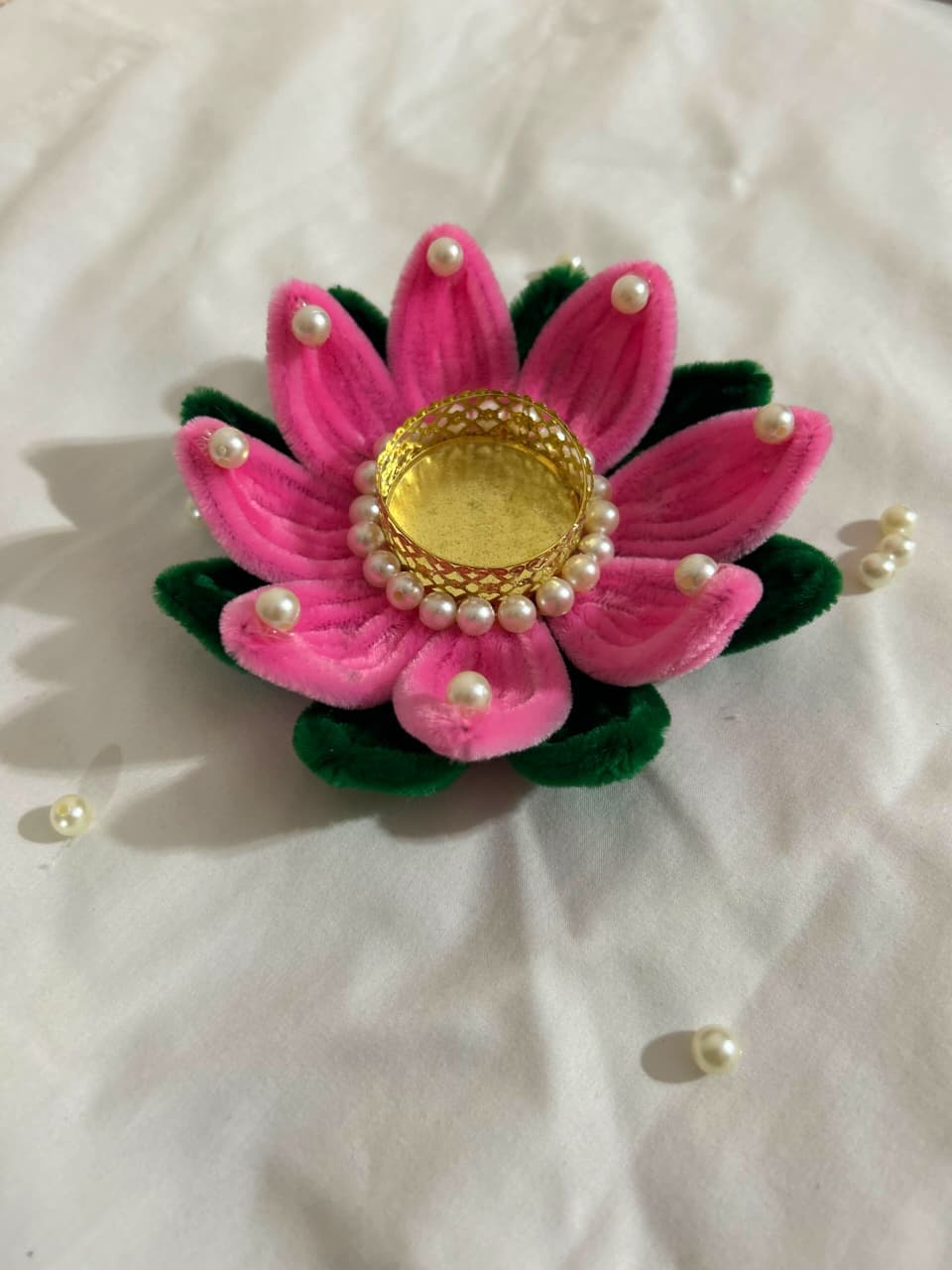 Beautiful handmade lotus-shaped diya holder crafted from colorful pipe cleaners